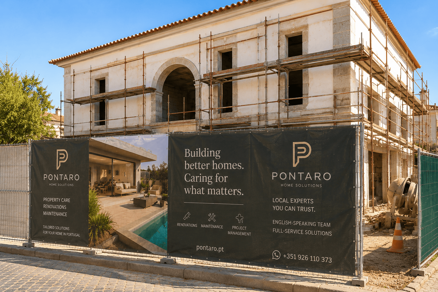 Pontaro Home Solutions branded site fence in front of an active renovation project in Portugal